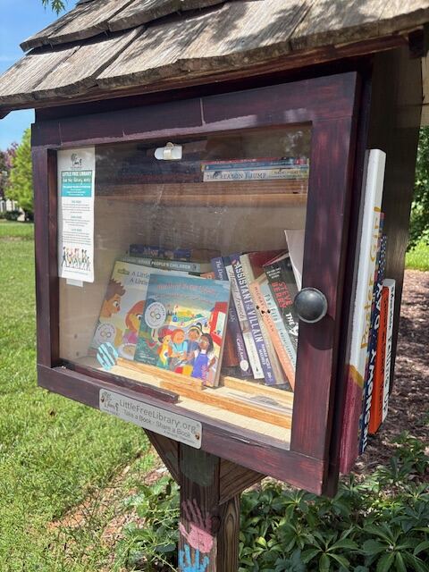 Little Free Library stocked with inclusive books