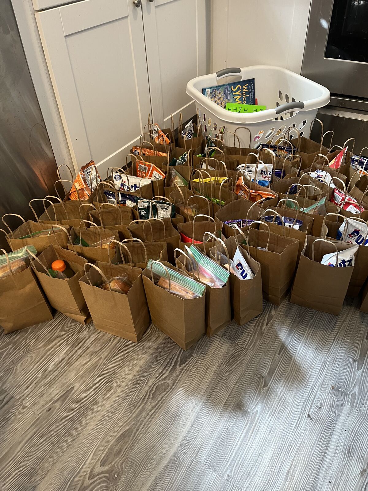 Dozens of packed gift bags ready for families