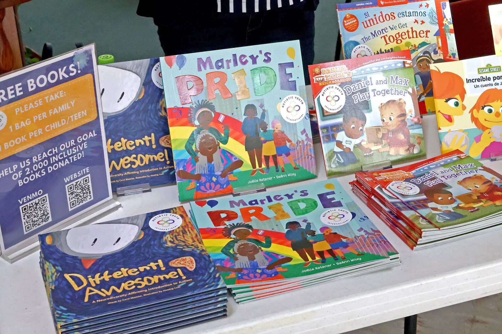 Free inclusive children's books displayed on a table